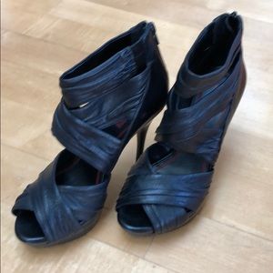 Strappy black leather platform stilettos heels